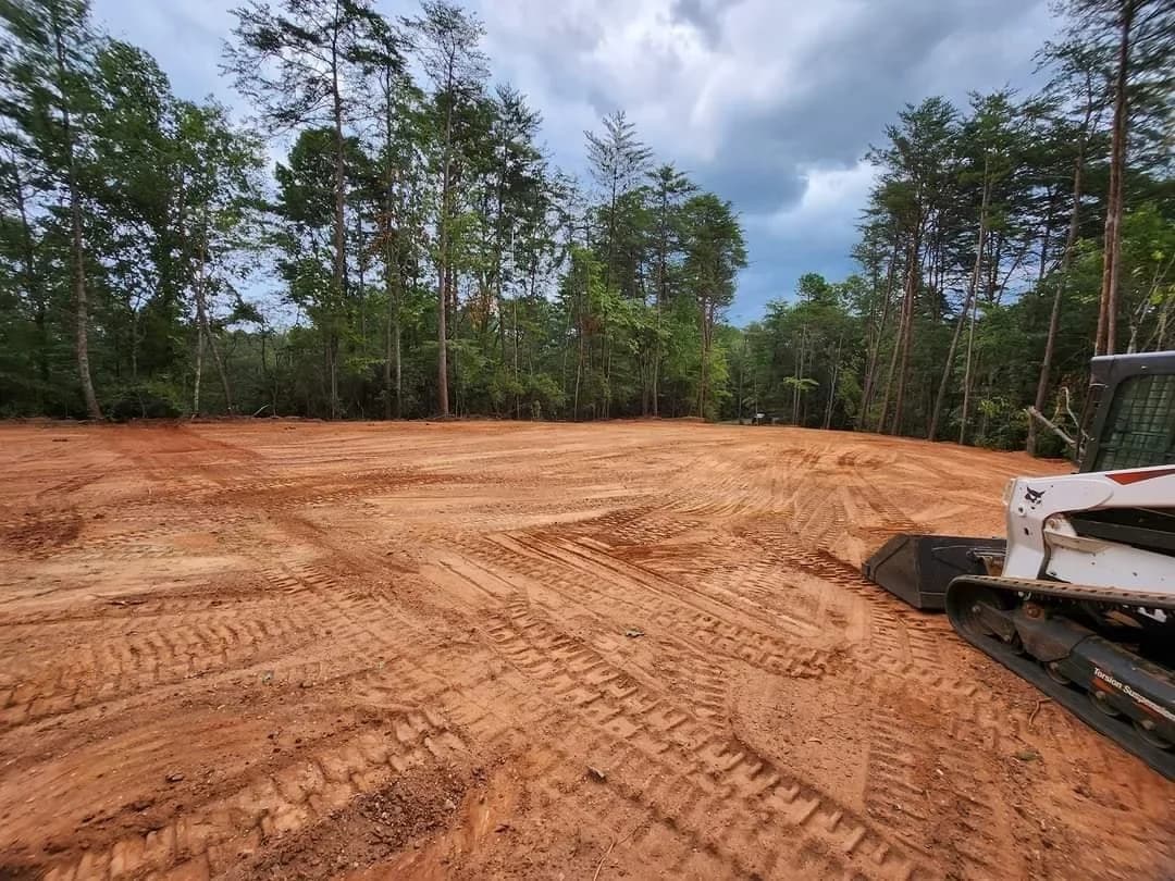 A residential site graded by CTech Construction in a wooded Georgia setting